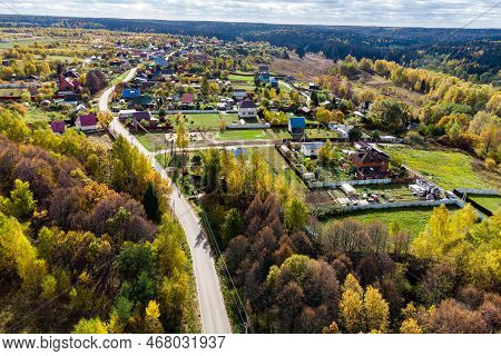 Aerial View Of A Rural Building Surrounded By A Colorful Autumn Landscape. Karpovo Village, Maloyaro
