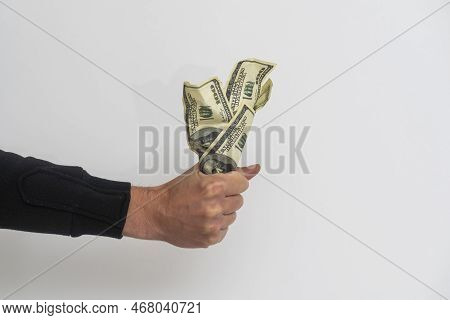 Mans Hand Holds American Dollars Money. Finance, Earnings, Crediting.