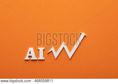 Artificial Intelligence Progress - Letters And Arrow In White On Orange Background