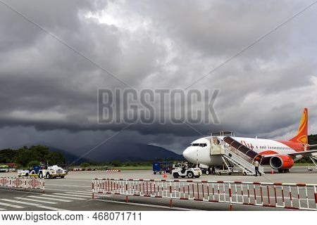 Malaysia, Langkawi, November, 2022: Airplane Preparation To Fly And Loading The Airplane With Baggag