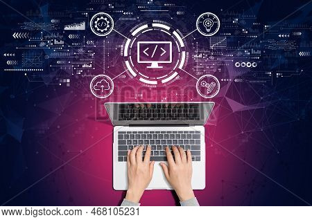 Web Development Concept With Person Using A Laptop Computer