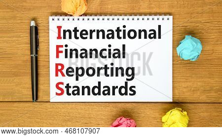 Ifrs Symbol. Concept Words Ifrs International Financial Reporting Standards On White Note On Beautif