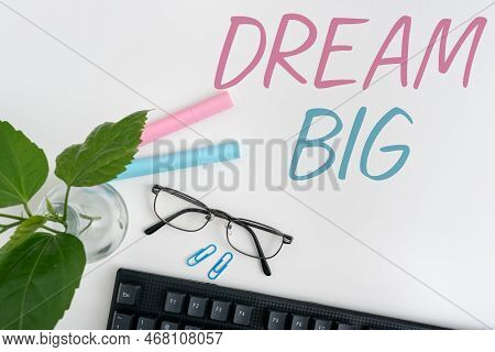 Hand Writing Sign Dream Big. Concept Meaning To Think Of Something High Value That You Want To Achie
