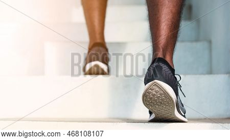 Close Up Athlete Shoes Of Legs Young Sport Runner Black Man Step Running Up To Climbing Stairs Doing