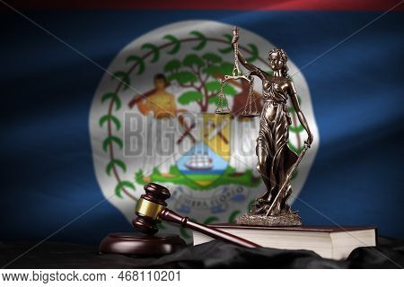 Belize Flag With Statue Of Lady Justice, Constitution And Judge Hammer On Black Drapery. Concept Of 