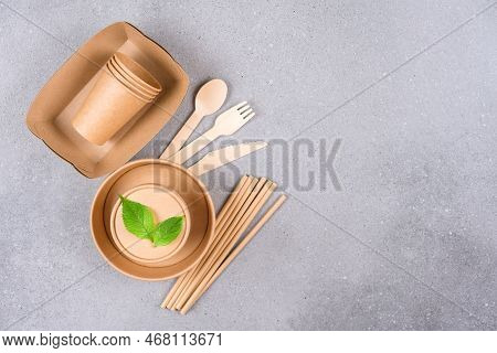 Eco Paper Utensils - Paper Plates And Cups, Food Containers, Drinking Straws And Wooden Cutlery Over