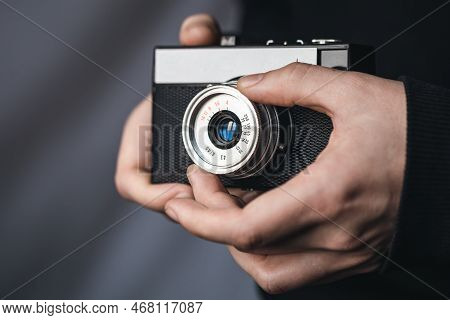 Close-up, Film Retro Camera In Male Hands.