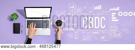 Cbdc - Central Bank Digital Currency Concept With Person Using A Laptop Computer