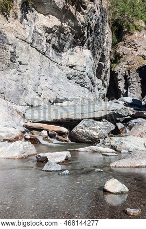 Long Exposure Of Water With Mist And Small Pebbles Formed By Lillaz Waterfall (cascate Di Lillaz) In