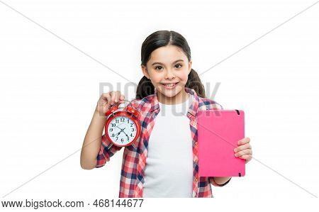 Cheerful School Girl With Alarm Clock Isolated On White. School Girl With Alarm Clock In Studio
