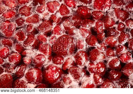 Top View, Close Up: Strawberry Jam In Making Progress Boiling. Process Of Making Homemade Strawberry
