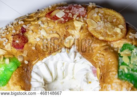 Roscón. Roscon De Reyes. Kingcake. Bun Made With A Sweet Dough In The Shape Of A Toroid Decorated Wi