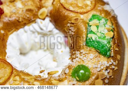 Roscón. Roscon De Reyes. Kingcake. Bun Made With A Sweet Dough In The Shape Of A Toroid Decorated Wi