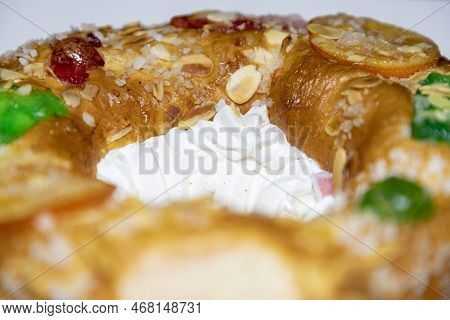 Roscón. Roscon De Reyes. Kingcake. Bun Made With A Sweet Dough In The Shape Of A Toroid Decorated Wi