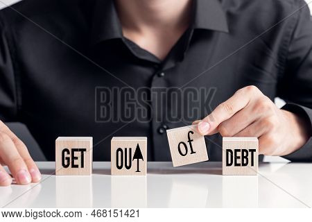 Get Out Of Debt, Text On Wooden Cubes, Pay Off Debts And Freedom From Debt Concept