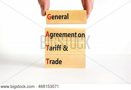 Gatt Symbol. Concept Words Gatt General Agreement On Tariff And Trade On Wooden Block On Beautiful W