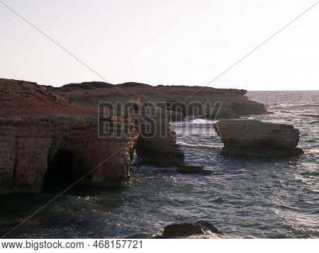 Water Caves And Rock Formations Close To Coral Bay On Cyprus Island.