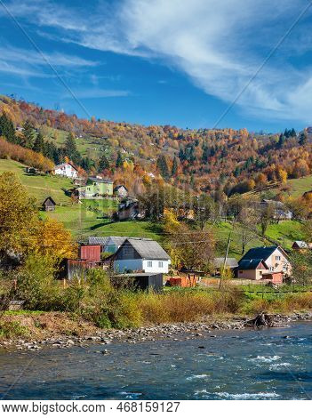 Autumn Carpathian Mountain White Tysa River Landscape With Multicolored Yellow-orange-red-brown Tree