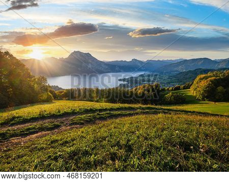 Peaceful Autumn Alps Mountain Lake With Clear Transparent Water And Reflections. Sunrise View To Tra