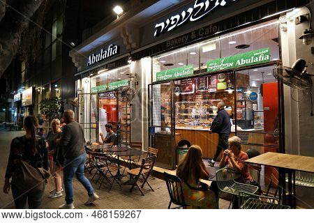 Tel Aviv, Israel - November 2, 2022: People Walk By Abulafia Bakery In Tel Aviv. Abulafia Is A Popul