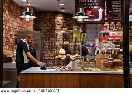 Tel Aviv, Israel - November 2, 2022: Seller In Abulafia Bakery In Tel Aviv. Abulafia Is A Popular Ba