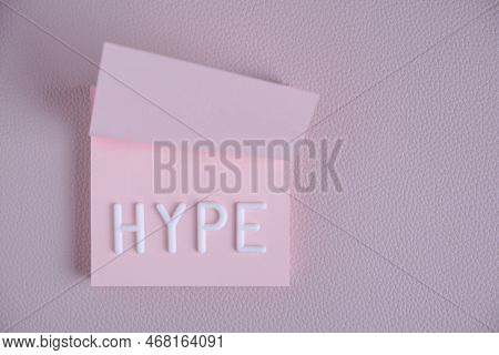 Word Hype Laid Out White Letters Pink Piece Paper.concept Hype, Popularity And Fun