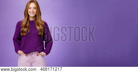 Optimistic Attractive Ginger Girl In 20s Wearing Purple Sweater Standing Ready And Energized Over Vi