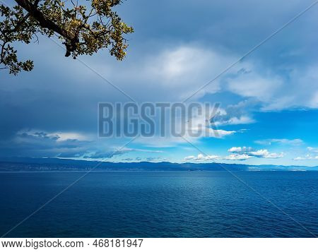 Croatian Seaside Landscape With Beautiful Clouds At The Sky Seen From The Town Of Lovran In Croatia