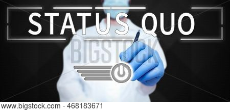 Hand Writing Sign Status Quo. Business Idea Existing State Of Affairs Regarding Social Or Political 
