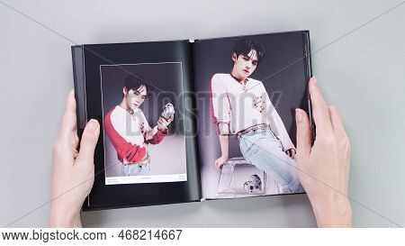 Fan Holding Stray Kids Maxident Mini Album Photobook On Grey. Music Cd. South Korean Boy Band Strayk