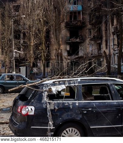 Irpin, Kyiv Region, Ukraine -  April 12, 2022: Russian Invasion Of Ukraine. Car Damaged By Russian S