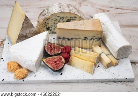Cheese Collection, Marble Board With French Cheeses Brie, Tomme, Matured Goat Cheese, Morbier  Serve