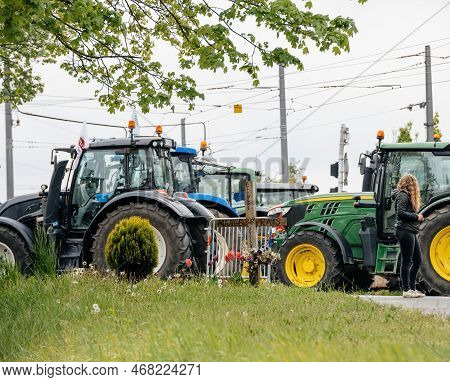 Strasbourg, France - April 30, 2021: Wooden Cross Next To Tractors Protest In Strasbourg To Put Pres