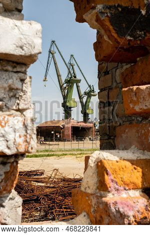 Gdansk, Poland - July 19 2022: Industrial Building At The Gdansk Shipyard, Former Lenin Shipyard, Pr