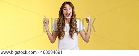 Surprised Cheerful Celebrating Girl Lively Discuss Near Awesome Event Pointing Up Index Fingers Smil
