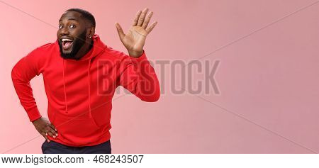 Attractive Funny African American Gay Beard In Red Hoodie Raise Palm Waving Hello Hi Howdy Gesture A