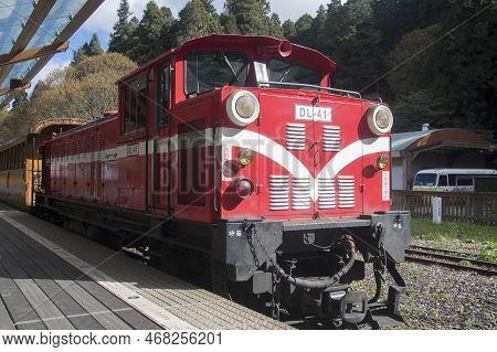 Alishan, Taiwan- 7 Dec, 2022: Red Train Stop At Alishan Station In Alishan National Scenic Area Taiw