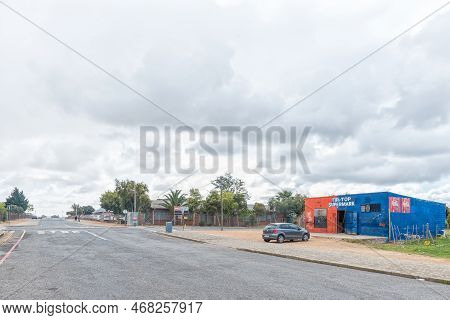 Bredasdorp, South Africa - Sep 23, 2022: A Street Scene, With A Supermarket And The De Heide Primary