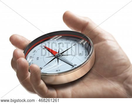 Hand Holding A Compass Over White Background. Strategic Orientation Or Direction Concept.