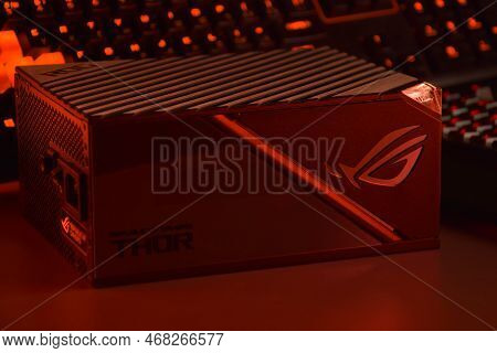 Computer Ac Power Supply Asus Rog Thor 1000W On A Dark Background.