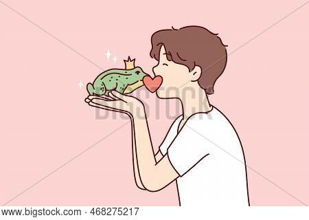 Guy Kisses Frog Princess With Crown On Head, Wishing That Animal Turned Into Beautiful Girl. Teenage