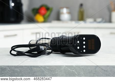 Thermal Immersion Circulator On Table In Kitchen. Sous Vide Cooking