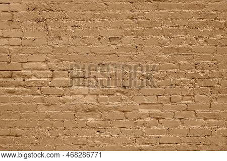 Closeup Of Grunge Brick Wall Painted Yellow