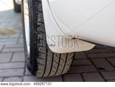 Car Mudguard Or Mudflap Of A Rear Wheel