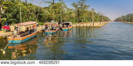 Lumbini, Nepal - November 09, 2019: Panorama Of Colorful Motorboats At The Canal Of The Mayadevi Tem