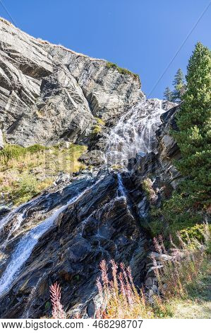 Lillaz Waterfall (cascate Di Lillaz) Wash Around Granite Karst Rapids Of Rock In Gran Paradiso Natio
