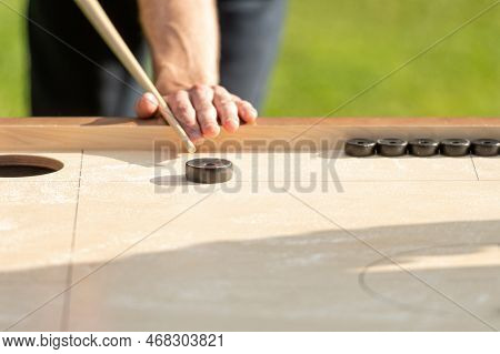 Men Playing Novuss Game. Novuss Is A National Sport In Latvia Similar To Pocket Billiards Or Pool.