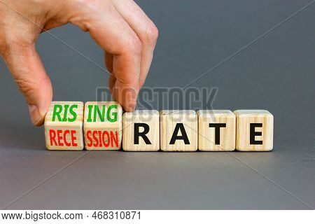 Recession Or Rising Rate Symbol. Concept Word Recession Rate Rising Rate On Wooden Cubes. Businessma