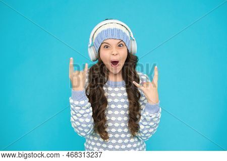 Create Feel-good Playlist. Music Mood. Little Child Knitted Sweater And Hat. Musical Suggestions For