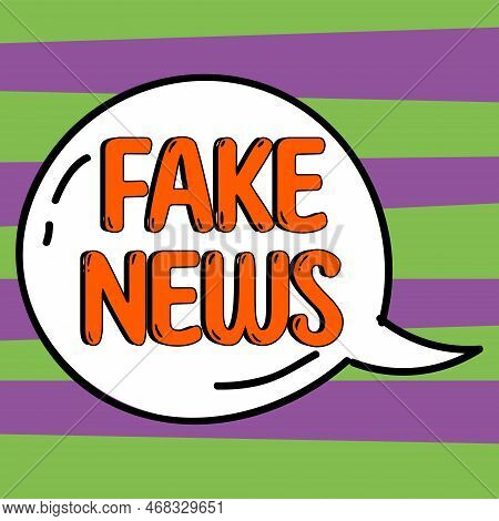 Hand Writing Sign Fake News. Business Concept Giving Information To People That Is Not True By The M